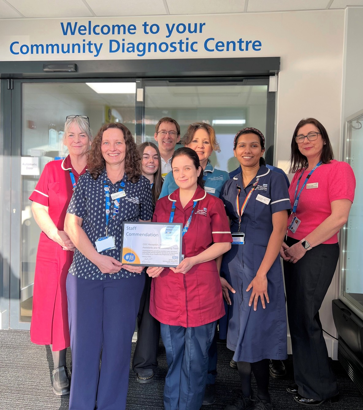 Some of the Northgate CDC team are pictured holding their framed staff commendation certificate. The group of eight includes reception, healthcare and nursing staff in uniform, along with our Executive Managing Director Jonathan Gardner